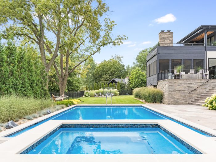 A House featuring a landscaped garden, emphasizing fall maintenance in DuPage County, IL.