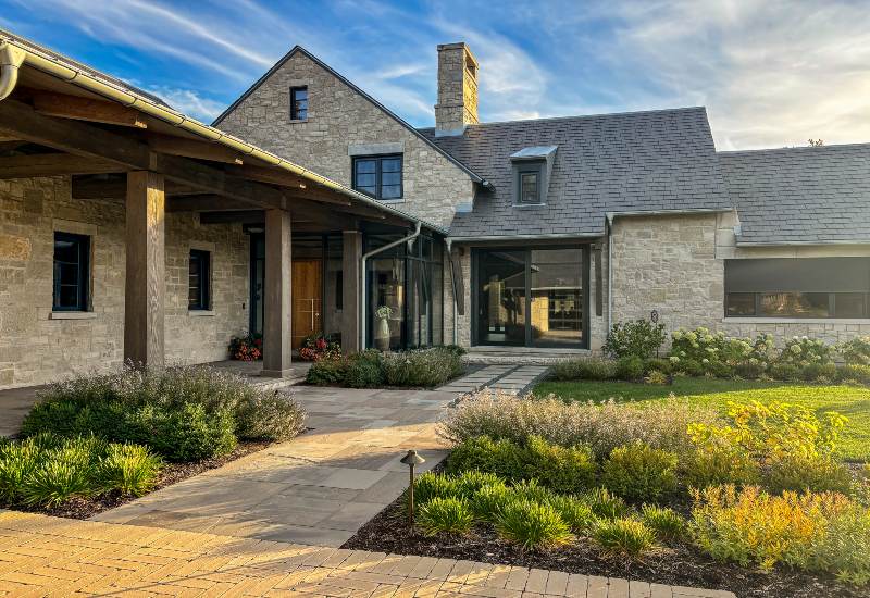 A beautiful home surrounded by well-maintained landscaping plants in DuPage County, IL