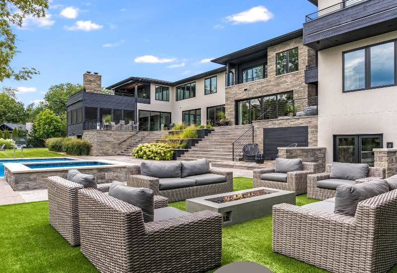 An elegant landscape design has been added to a modern house in DuPage County, IL